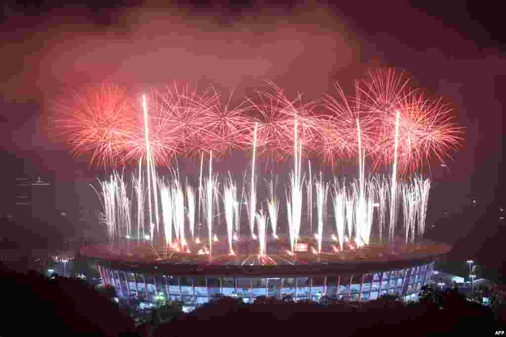 Fireworks explode over the Gelora Bung Karno main stadium during the closing ceremony of the 2018 Asian Games in Jakarta, Indonesia.