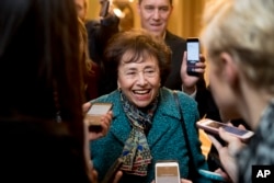 FILE - House Appropriations Committee Chair Nita Lowey, D-N.Y., speaks to reporters as she walks out of a closed-door meeting on Capitol Hill, Feb. 11, 2019.