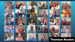 Virtual crowd applauds former first lady Michelle Obama on the all virtual 2020 Democratic Convention hosted from Milwaukee, Wisconsin, Aug. 18, 2020.