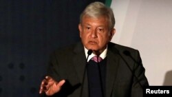Mexican President-elect Andres Manuel Lopez Obrador talks about his security plan to the media in Mexico City, Nov. 14, 2018. 