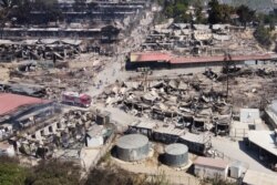 An aerial view of destroyed shelters following a fire at the Moria camp for refugees and migrants on the Island of Lesbos, Greece, Sept. 9, 2020.