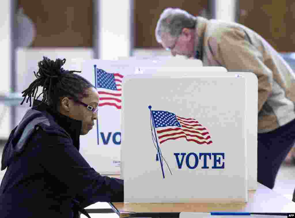 People vote in the Super Tuesday primary at Centerville High School, March 1, 2016, in Centerville, Virginia.