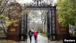 FILE PHOTO -- Students walk on the campus of Yale University in New Haven, Connecticut November 12, 2015. 