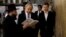 FILE PHOTO: Israel's Prime Minister Benjamin Netanyahu (C) reads a prayer with Western Wall Rabbi Shmuel Rabinowitz (L) as his son Yair (R) stands next to him, at the Western Wall, Judaism's holiest prayer site, in Jerusalem's Old City March 18, 2015.