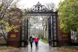 FILE - Students walk on the campus of Yale University in New Haven, Connecticut, November 12, 2015.