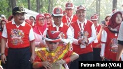 Menteri Pemberdayaan Perempuan dan Perlindungan Anak, Yohana Yambise menghadiri puncak peringatan Hari Anak Nasional 2018 di Pasuruan, Jawa Timur, 23 Juli 2018. (Foto:VOA/Petrus Riski).