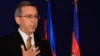 FILE - U.S. Principal Deputy Assistant Secretary of State for East Asian and Pacific Affairs Scot Marciel gestures during a press conference in Phnom Penh, Cambodia, Nov. 4, 2013. 