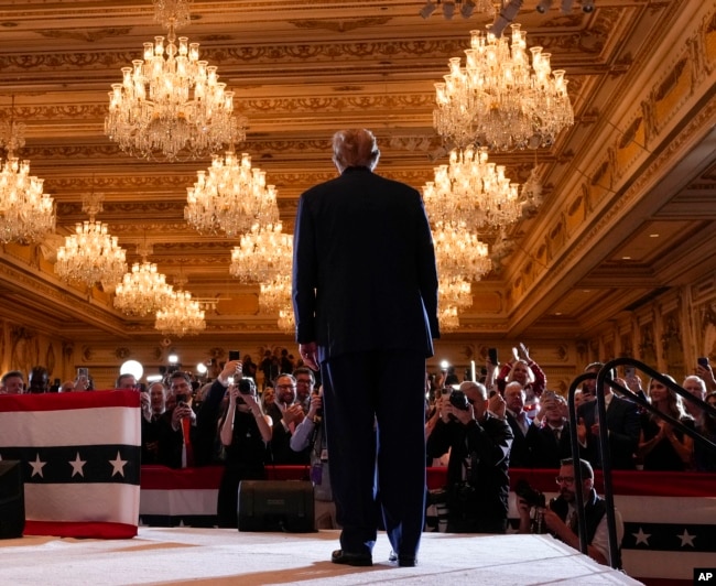 Republican presidential candidate and former President Donald Trump arrives at a Super Tuesday election night party, March 5, 2024, at Mar-a-Lago in Palm Beach, Florida.