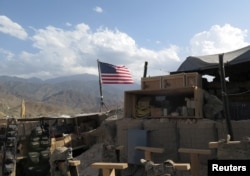 U.S. flag is seen at a post in Deh Bala district, Nangarhar province, Afghanistan July 7, 2018.