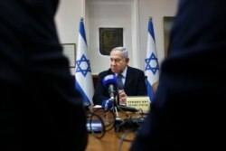 FILE - Israeli Prime Minister Benjamin Netanyahu chairs the weekly cabinet meeting at the Prime Minister's office in Jerusalem, Nov. 3, 2019.