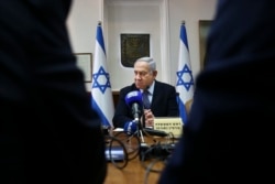 FILE - Israeli Prime Minister Benjamin Netanyahu chairs the weekly cabinet meeting at the Prime Minister's office in Jerusalem, Nov. 3, 2019.