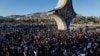 Syrian activists gather at the Umayyad square during a protest to demand a secular state, in Damascus, Syria, Dec. 19, 2024. 