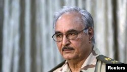 General Khalifa Haftar attends a news conference in Abyar, east of Benghazi, May 17, 2014.