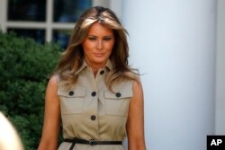 First Lady Melania Trump walks after speaking during a White House National Day of Prayer Service in the Rose Garden of the White House, Thursday, May 7, 2020, in Washington. (AP Photo/Alex Brandon)