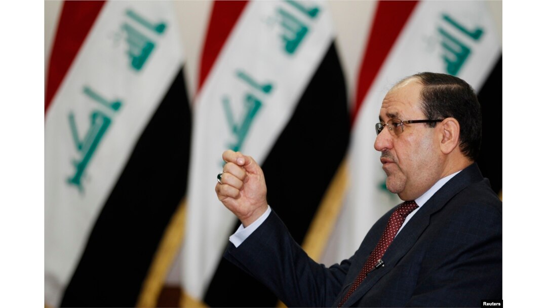 FILE - Iraq's Prime Minister Nuri al-Maliki speaks during an interview with Reuters in Baghdad in 2014..
