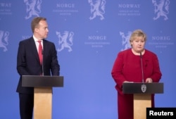 Norway's Prime Minister Erna Solberg, right, and Foreign Minister Borge Brende speak at news conference after the release of Norwegian-British national Joshua French from a Congo prison, in Oslo, Norway, May 17, 2017.