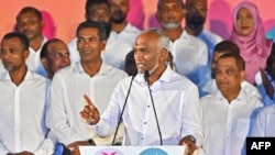 Maldives' President Mohamed Muizzu speaks at a rally to celebrate the victory in the parliamentary elections, in Male, Maldives, on April 22, 2024.