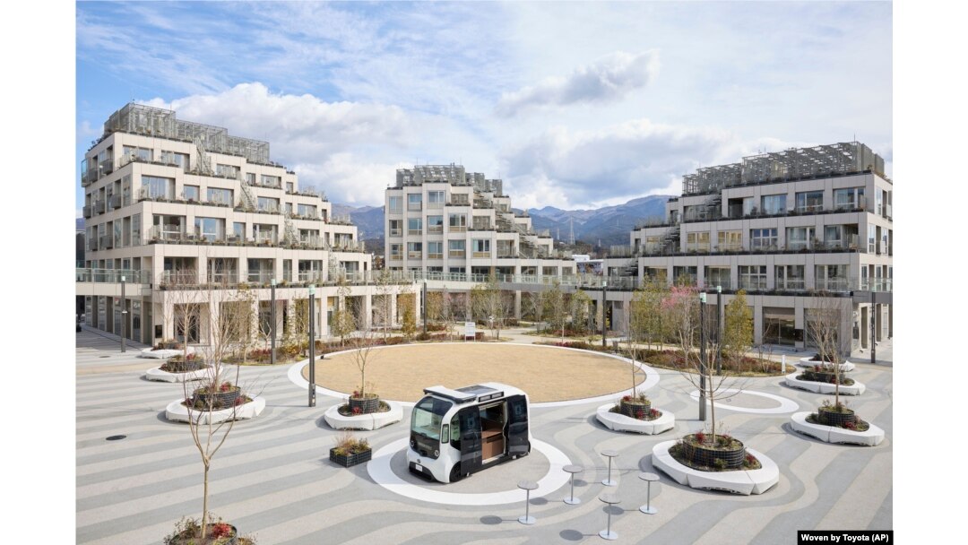 Rich in cash, Japan automaker Toyota builds city to test