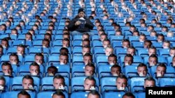 Britain Soccer Football - Leicester City v Everton - Premier League - King Power Stadium - 26/12/16 General view of a fan with Jamie Vardy masks on the seats before the match.