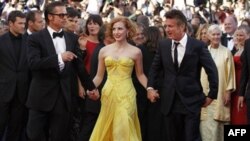 From left, actors Brad Pitt, Jessica Chastain and Sean Penn arrive for the screening of 'The Tree of Life' at Cannes international film festival last May