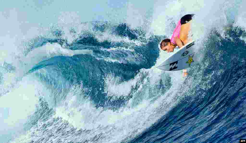 This handout photo released by the World Surf League shows Courtney Conlogue in action during her quarter-final at the Fiji Women's Pro at Tavarua.