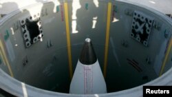 FILE - A ground-based U.S. missile is seen in its silo at Vandenberg Air Force Base in California.