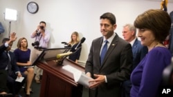 House Speaker Paul Ryan of Wis., accompanied by House Majority Leader Kevin McCarthy of Calif., center, and Rep. Cathy McMorris Rodgers, R-Wash., leaves a news conference after a GOP caucus meeting on Capitol Hill in Washington, April 26, 2017. 