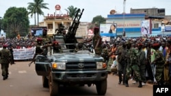 Rebel Seleka coalition soldiers arrive in Bangui, March 30, 2013. The Central African Republic's new strongman Michel Djotodia vowed Saturday not to contest 2016 polls and hand over power at the end of the three-year transition he declared after his coup 