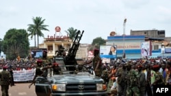Rebel Seleka coalition soldiers arrive in Bangui, March 30, 2013.