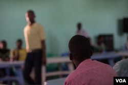 A teacher, himself a former Al-Shabab member, instructs fellow defectors at a rehabilitation center for former militants in Baidoa, Somalia, Sept. 17, 2016. (Photo: J. Patinkin/VOA)