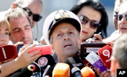 Navy spokesman Enrique Balbi talks to journalists in Buenos Aires, Argentina, Nov. 21, 2017.