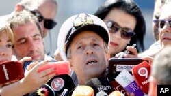 Navy spokesman Enrique Balbi talks to journalists in Buenos Aires, Argentina, Nov. 21, 2017.