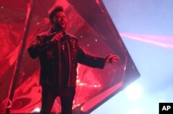 The Weeknd performs "Starboy" at the American Music Awards at the Microsoft Theater on Nov. 20, 2016, in Los Angeles.