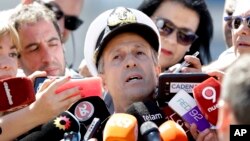 Navy spokesman Enrique Balbi talks to journalists in Buenos Aires, Argentina, Nov. 21, 2017. The search for the ARA San Juan Argentine submarine continues, which has been missing with 44 sailors aboard since last Wednesday. 