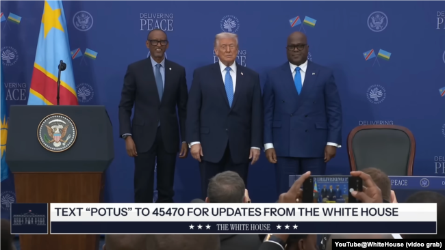 资料照片：美国总统特朗普、卢旺达总统卡加梅(左)和刚果民主共和国总统齐塞克迪在华盛顿参加协议签署仪式后合影。(2025年12月4日)