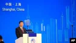 中国国家主席习近平在上海进口交易会开幕式上。