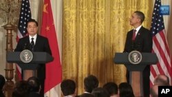 奥巴马和胡锦涛在记者会上