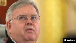 FILE - U.S. Ambassador to Russia John Tefft is pictured at the Kremlin in Moscow, Nov. 19, 2014.