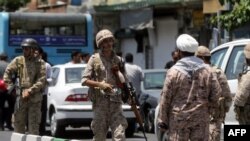 FILE - Members of the Iranian Revolutionary Guard are seen in Tehran, June 7, 2017. The U.S. on Dec. 8, 2022, imposed sanctions on a Turkish businessman accused of working on behalf of Iran's Revolutionary Guard Corps.