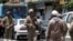 FILE - Members of the Iranian Revolutionary Guard are seen in Tehran, June 7, 2017. The U.S. on Dec. 8, 2022, imposed sanctions on a Turkish businessman accused of working on behalf of Iran's Revolutionary Guard Corps.
