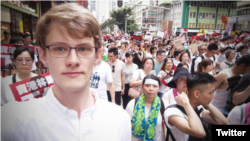 2019年6月9日，德国90后穆达伟（David Missal）和上百万港人一道走在“守护香港反送中”大游行的队伍里。“今日我係香港人，”他在推特上写道。 