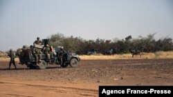 FILE - A detachment of anti-jihadist Special Forces elements patrol on Nov. 6, 2021, in Niger's Tillaberi region. An IED blast killed five Nigerien soldiers in the region's Gotheye district on Feb. 16, 2022.