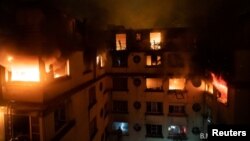 A residential building is engulfed in flames in Paris, France Feb. 5, 2019 in this image obtained from social media. (B. Moser/Brigade des Sapeurs-Pompiers de Paris (BSPP) via Reuters)