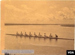 Yale's 1880 varsity crew team in the New Haven harbor. Chung Mun Yew is at the helm. (Manuscripts and Archives, Yale University)