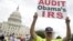 Demonstrators protest the Internal Revenue Service targeting of the Tea Party and similar groups during a rally outside the US Capitol in Washington, DC, June 19, 2013.