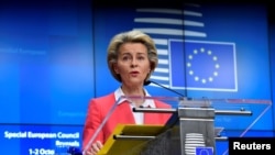 European Commission President Ursula von der Leyen addresses the media on the second day of a European Union leaders summit at the Europa building in Brussels, Belgium, Oct. 2, 2020.