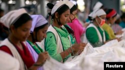 Women work at Goldtex Limited garment factory inside the Dhaka Export Processing Zone (DEPZ) in Savar, April 11, 2013. 