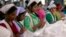 Women work at Goldtex Limited garment factory inside the Dhaka Export Processing Zone (DEPZ) in Savar, April 11, 2013. 