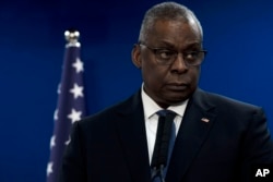 FILE - U.S. Secretary of Defense Lloyd Austin makes a joint statement with Israel Minister of Defense Yoav Gallant, after their meeting about Israel's military operation in Gaza, in Tel Aviv, Israel, December 28, 2023.
