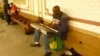 New York subway musician Christopher Campbell thanks his mother for the gift of a spiritual life. (VOA/A. Phillips)